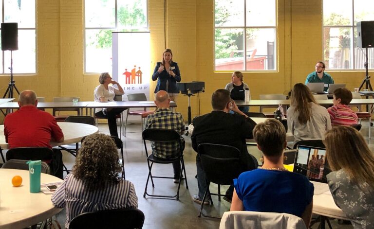 Citizens Utility Board of Michigan Executive Director Amy Bandyk speaks at the Grand Rapids Clean Energy Forum on June 28, 2019. Charlotte Jameson, Michigan Environmental Council energy policy & legislative affairs director and board member for CUB of Michigan, is seated to Amy’s left, and Environmental Policy & Law Center Senior Attorney Margrethe Kearney is seated to Amy’s right.