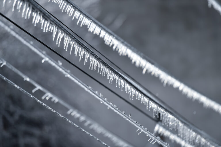 Electricity cables covered in ice