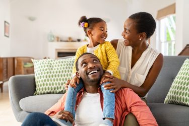 Happy family inside a home